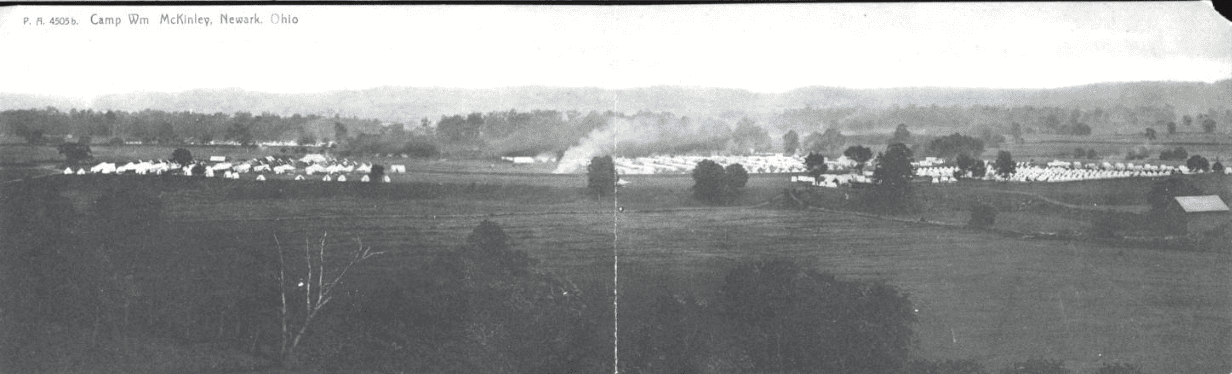 Black and white photograph of a military camp