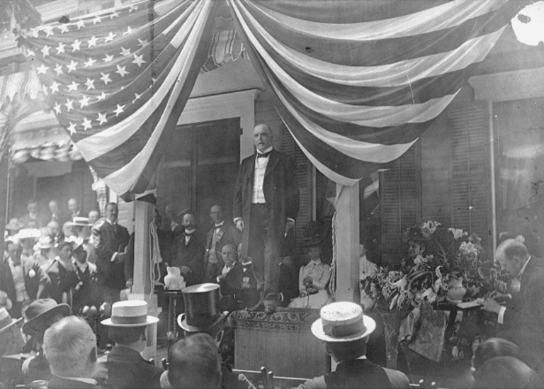 William McKinley speaks to a crowd of visitors from the front porch of his home in Canton, Ohio, during the 1896 presidential campaign